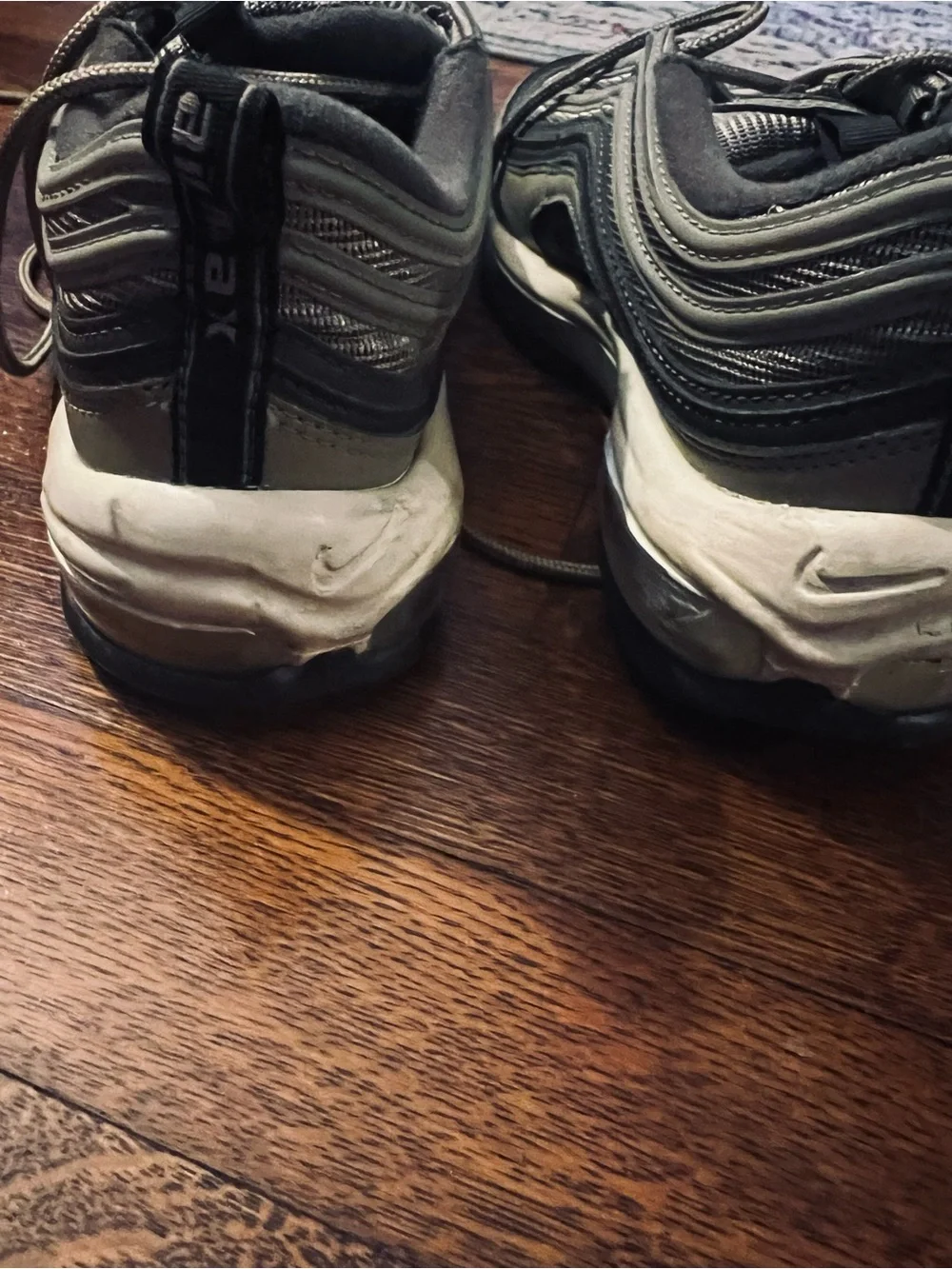 Nike women’s Air Max 97 in Olive Green . Size 8.5. Gently used.